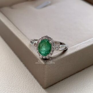 Natural Oval  Emerald Green Gem in a Dainty Silver Halo Ring